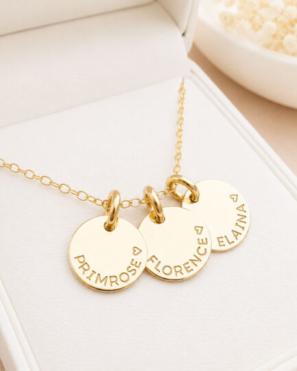 childrens names hand stamped on necklace