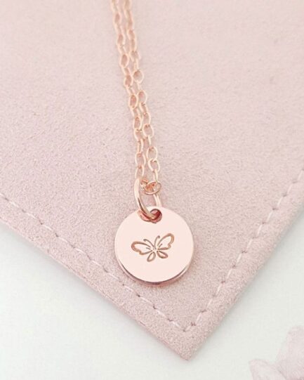 rose gold pendant with butterfly symbol