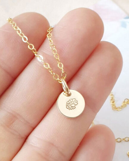 gold birth flower pendant