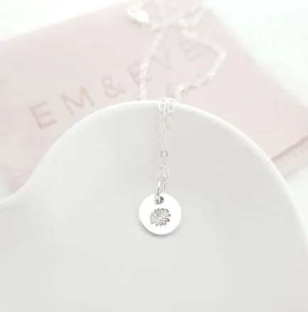 silver birth flower pendant